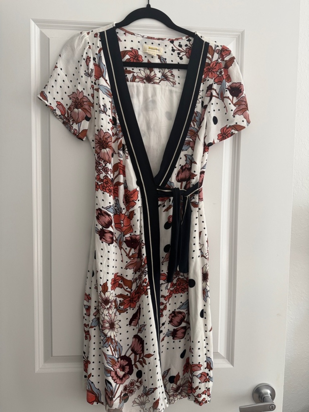 NWOT Mauve Anthropologie Floral Wrap Dress with Black Trim.